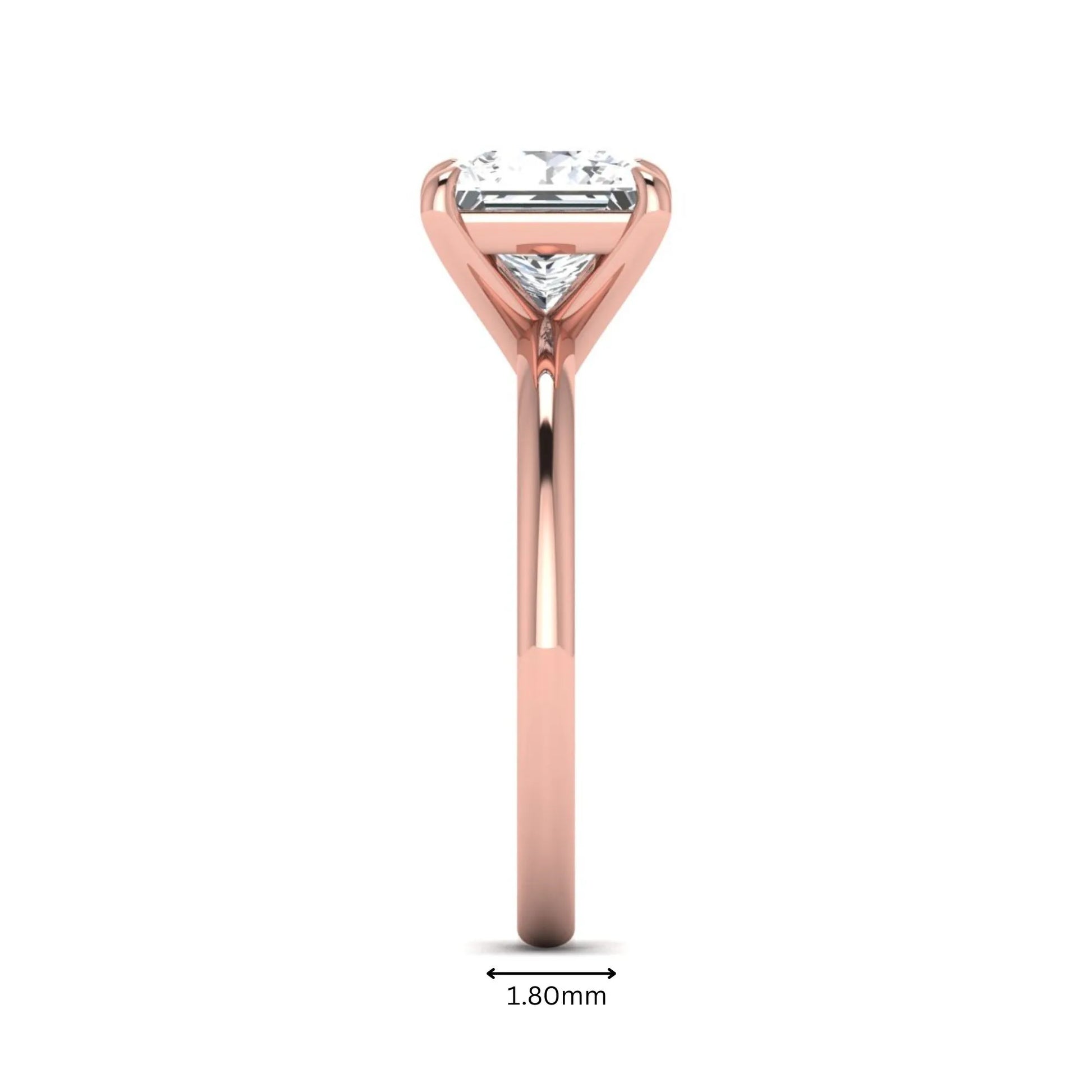 Princess cut lab grown diamond solitaire engagement ring with four-prong setting and rose gold tone band.