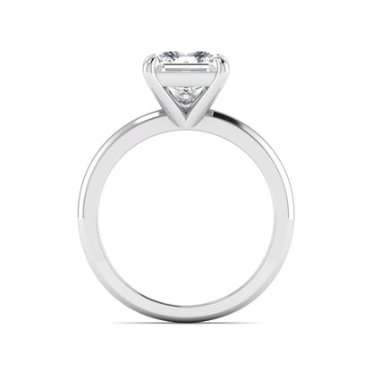 Princess cut lab grown diamond solitaire engagement ring with four-prong setting and white gold tone band.