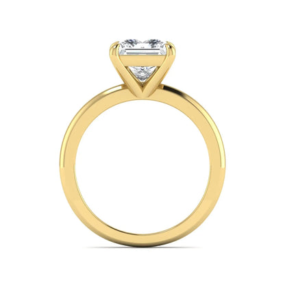 Princess cut lab grown diamond solitaire engagement ring with four-prong setting and yellow gold tone band.