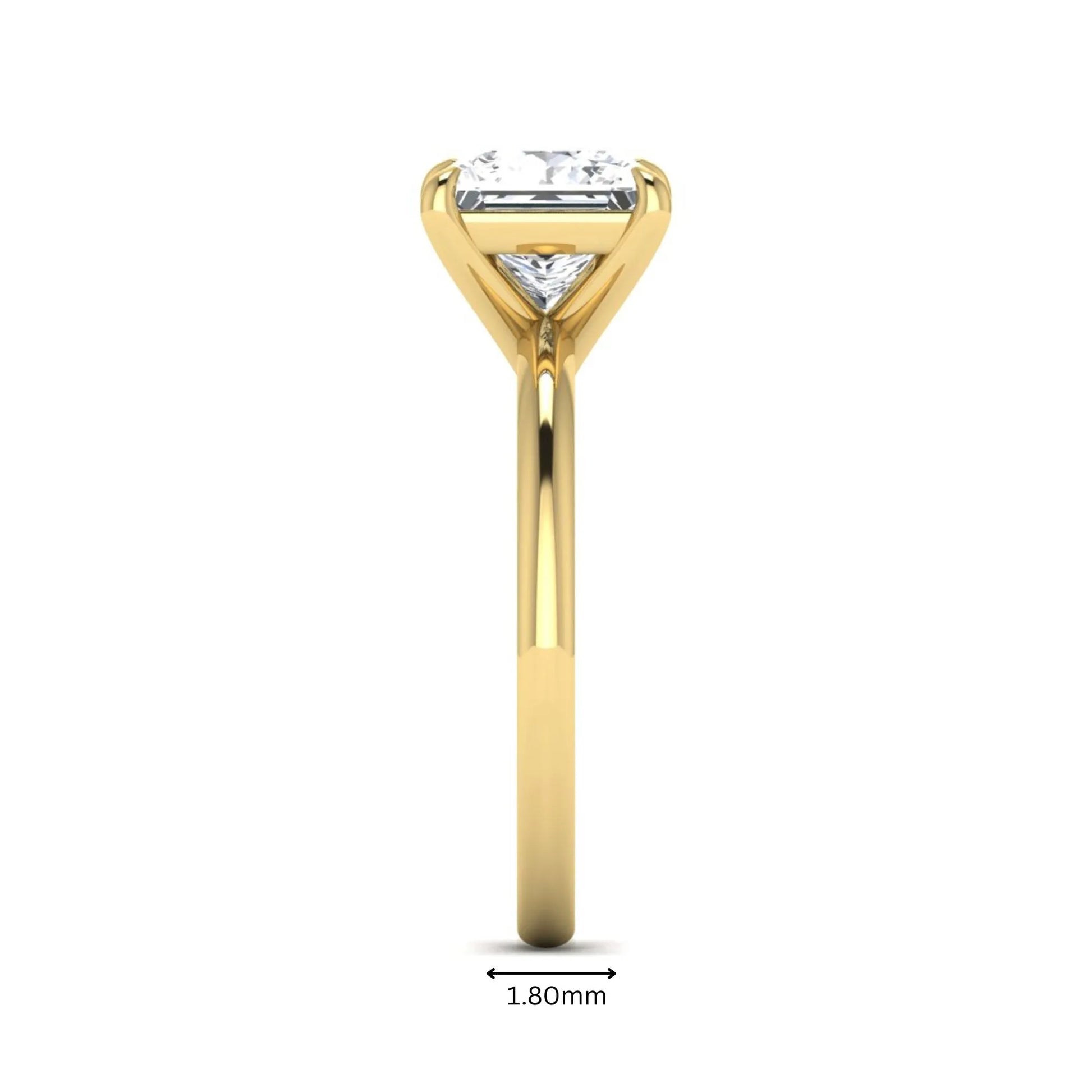 Princess cut lab grown diamond solitaire engagement ring with four-prong setting and yellow gold tone band.