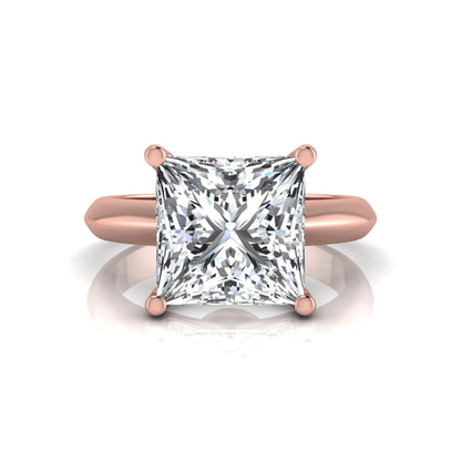 Princess cut lab grown diamond solitaire engagement ring in rose gold featuring a 3.67 carat IGI certified center diamond.