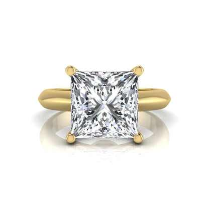 Princess cut lab grown diamond solitaire engagement ring in yellow gold featuring a 3.67 carat IGI certified center diamond.