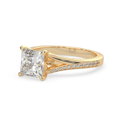 yellow Gold ring with a lab grown diamond on a white background