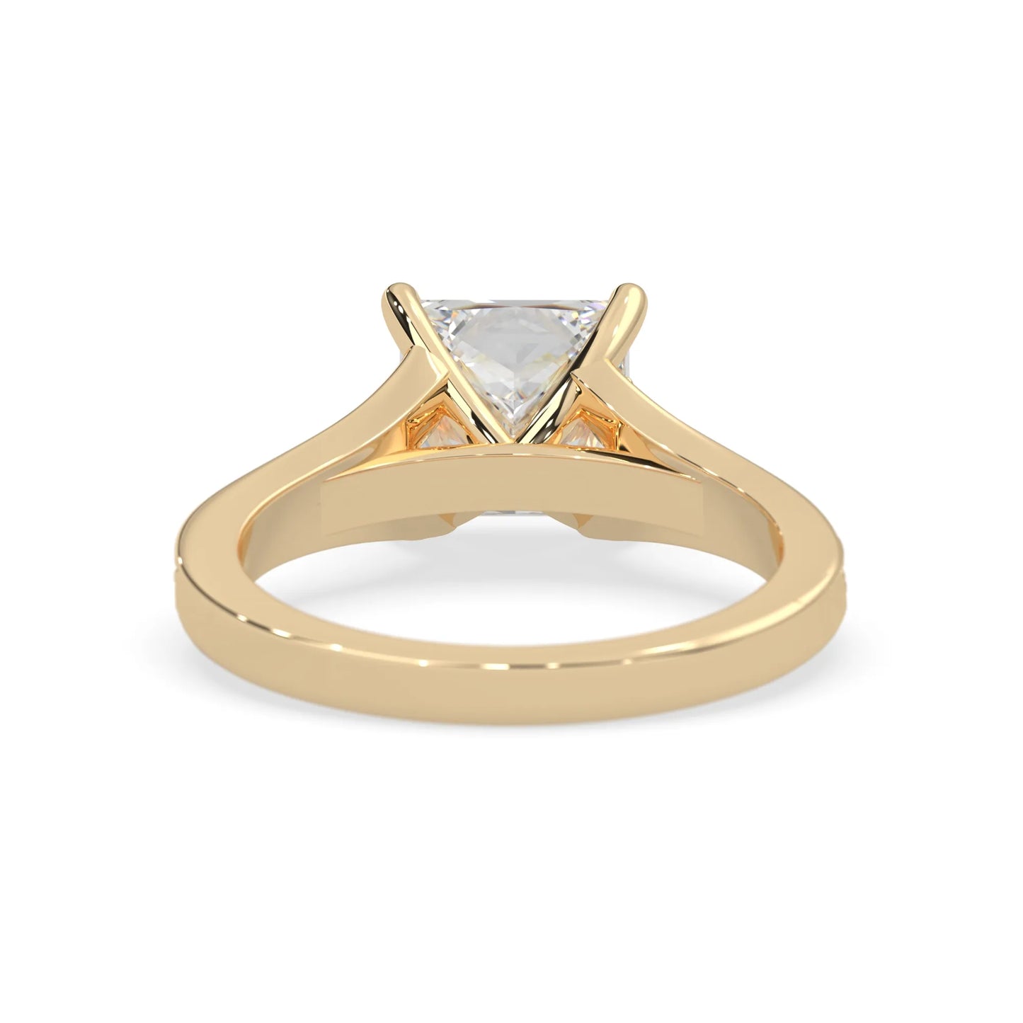 yellow Gold ring with a lab grown diamond on a white background