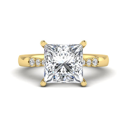 Princess cut lab grown diamond vintage solitaire engagement ring featuring a 4.12 carat IGI certified center diamond with vintage scrollwork and round diamond accents in yellow gold