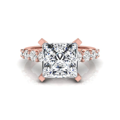 Princess cut lab grown diamond engagement ring with round side diamonds in rose gold.