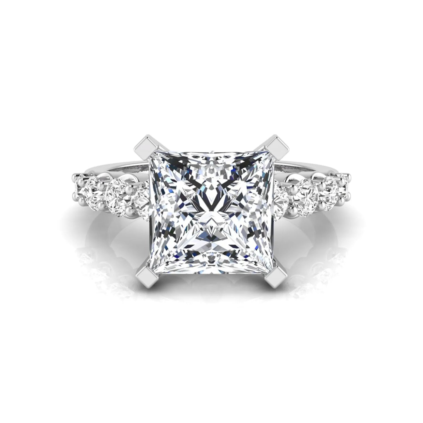 Princess cut lab grown diamond engagement ring with round side diamonds in white gold.