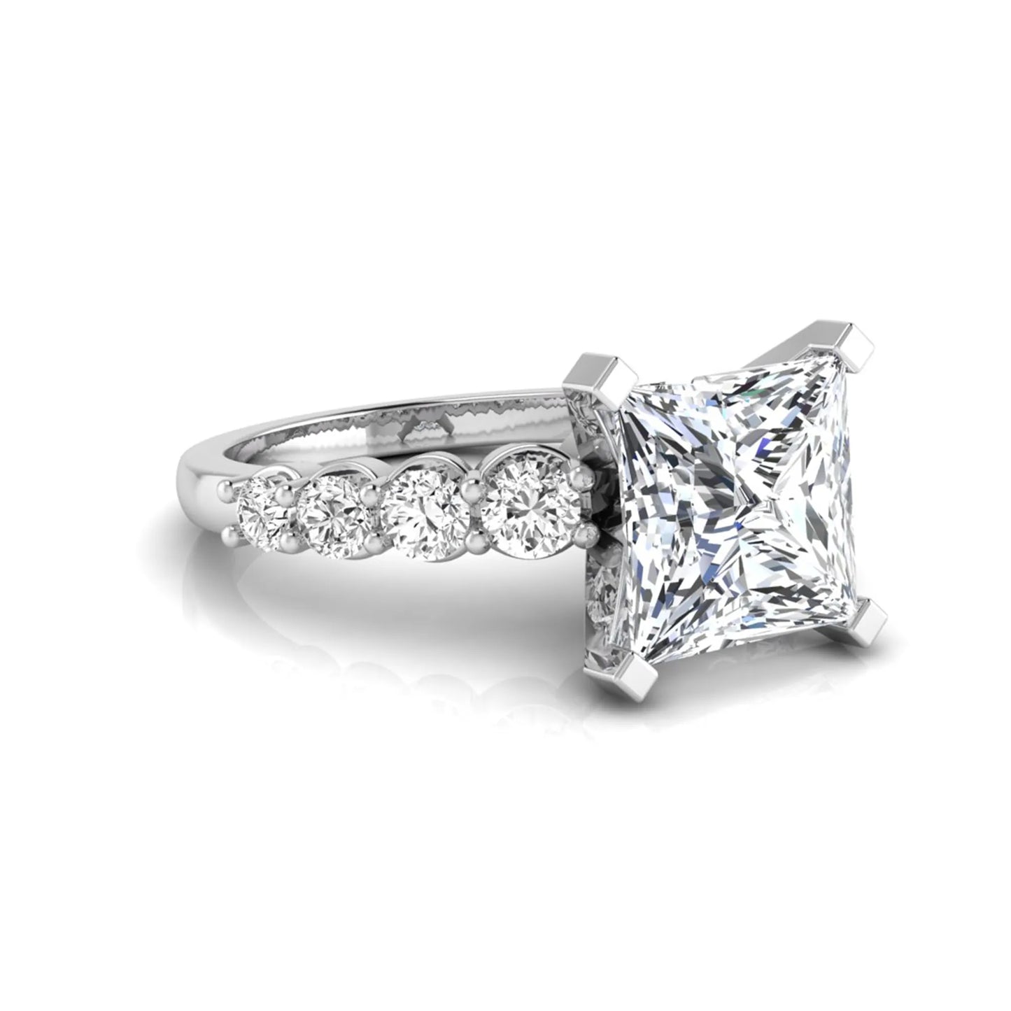 Princess cut lab grown diamond engagement ring with round side diamonds in white gold.