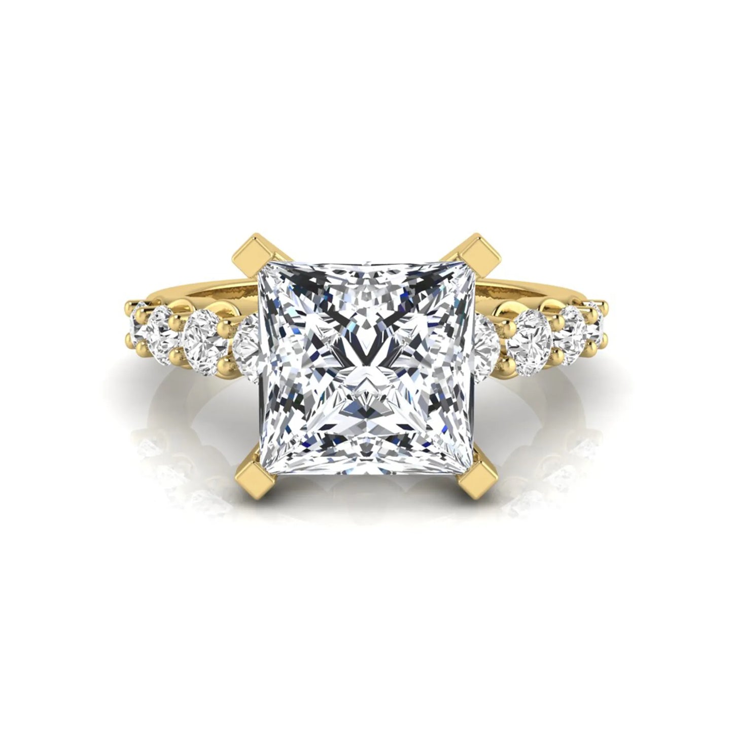Princess cut lab grown diamond engagement ring with round side diamonds in yellow gold.