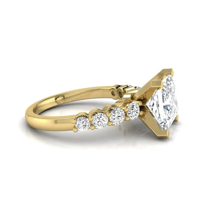 Princess cut lab grown diamond engagement ring with round side diamonds in yellow gold.