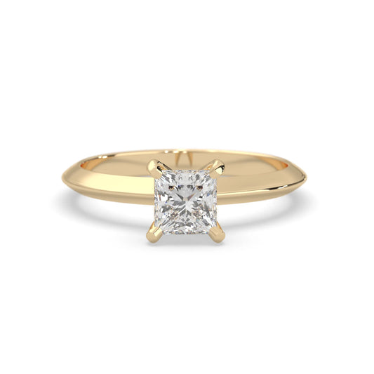 yellow-gold ring with a diamond on a white background