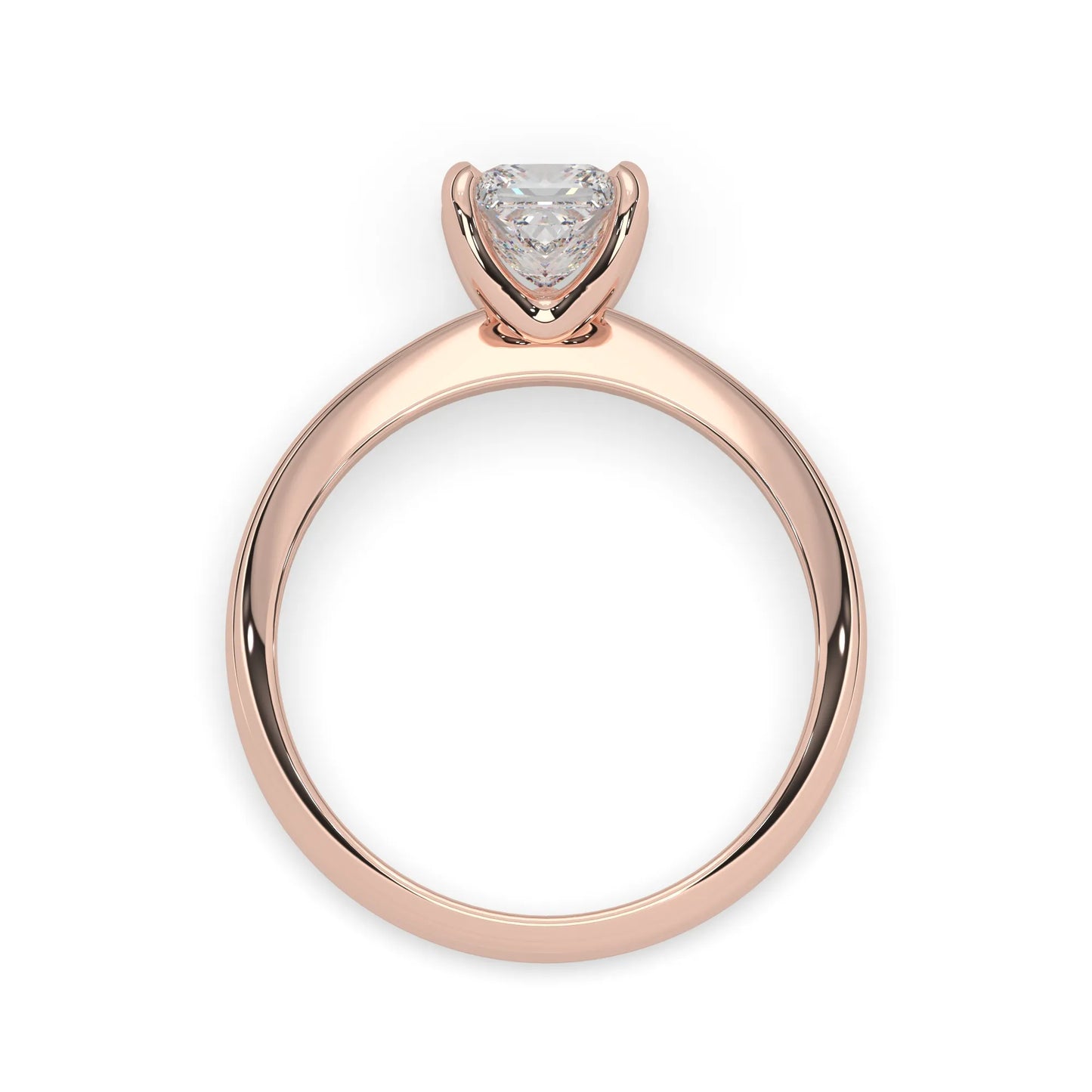 Rose-gold ring with a heart-shaped diamond on a white background