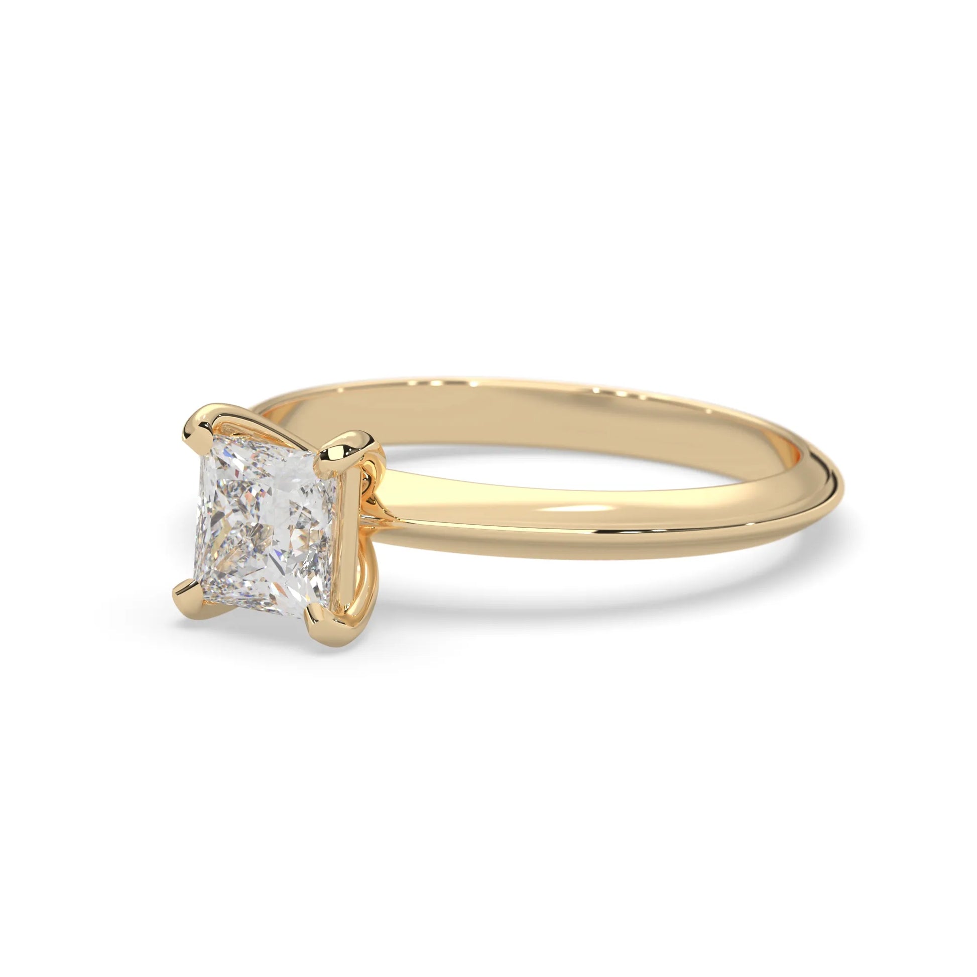 yellow-Gold ring with a square-cut diamond on a white background