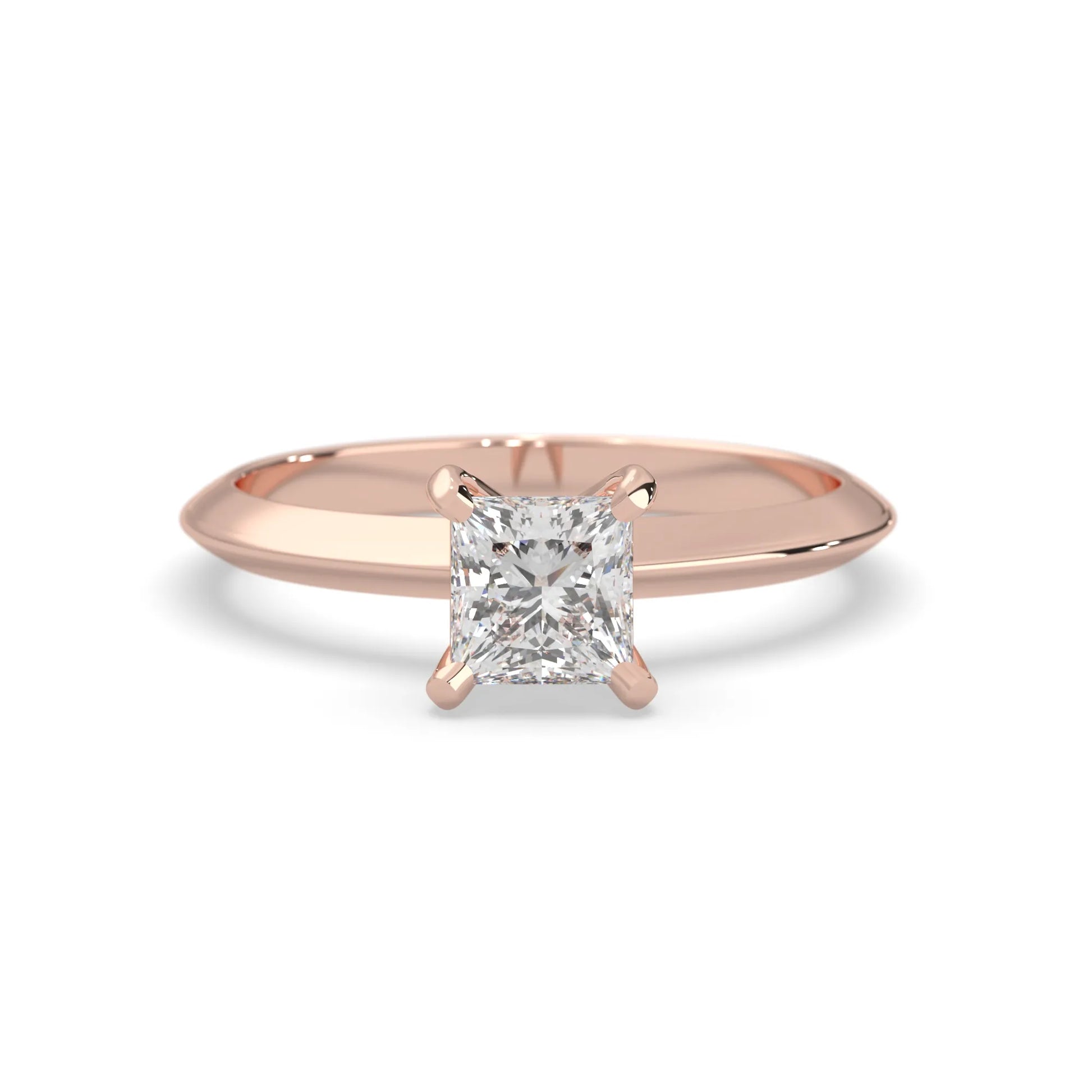 rose-gold ring with a diamond on a white background
