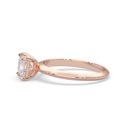 Rose-gold ring with a diamond on a white background