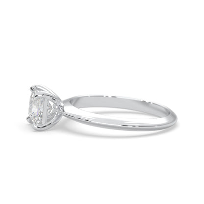 white-gold Diamond ring with a pear-shaped center stone on a white background