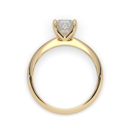 yellow-Gold ring with a heart-shaped diamond on a white background