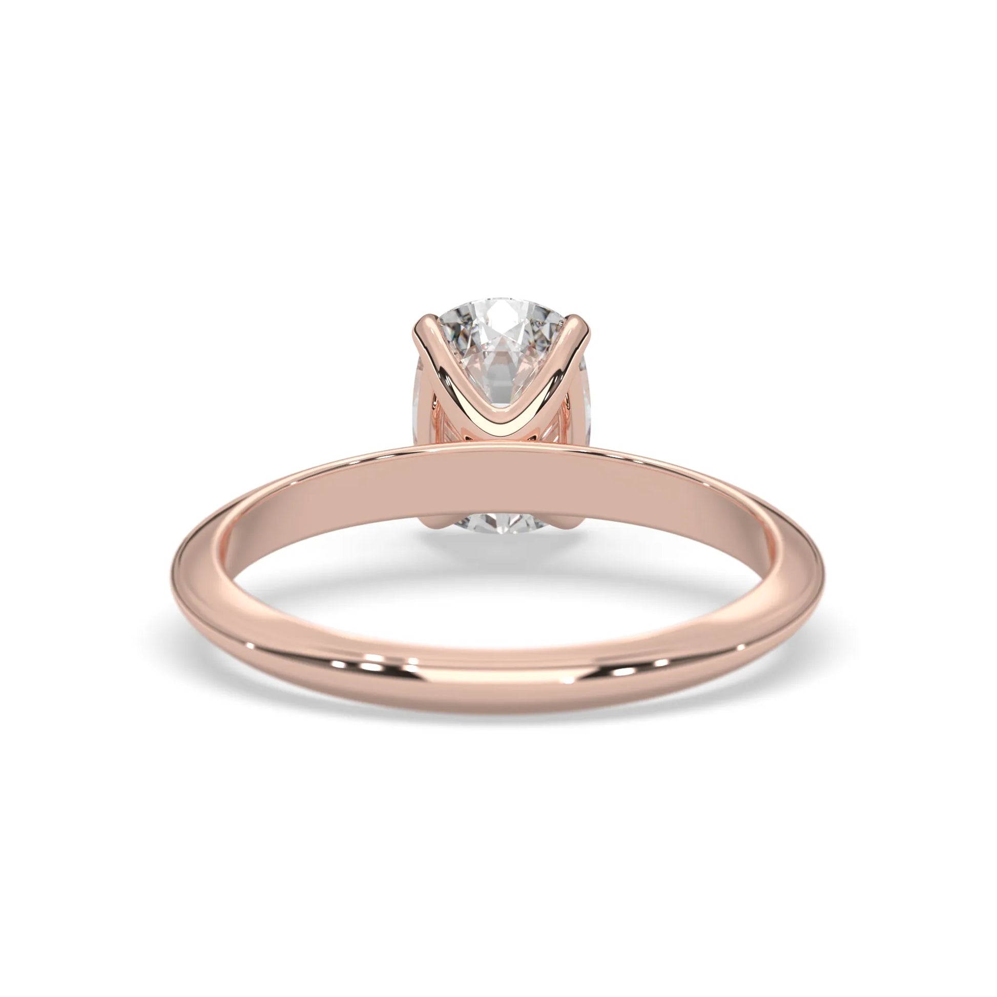Rose-gold ring with a diamond on a white background