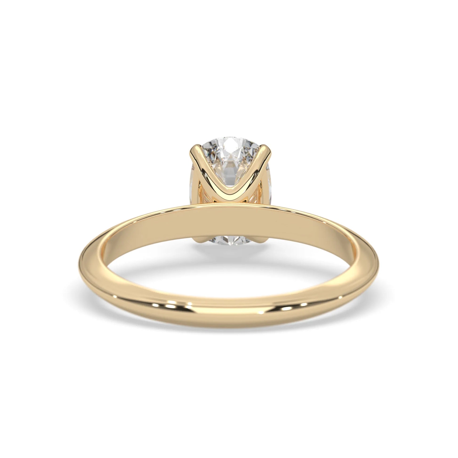 yellow-Gold ring with a diamond on a white background