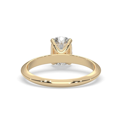yellow-Gold ring with a diamond on a white background