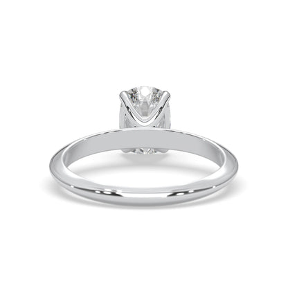 white-gold ring with a diamond on a white background