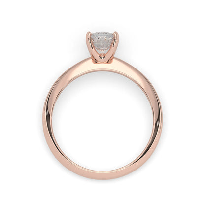 Rose-gold ring with a diamond on a white background