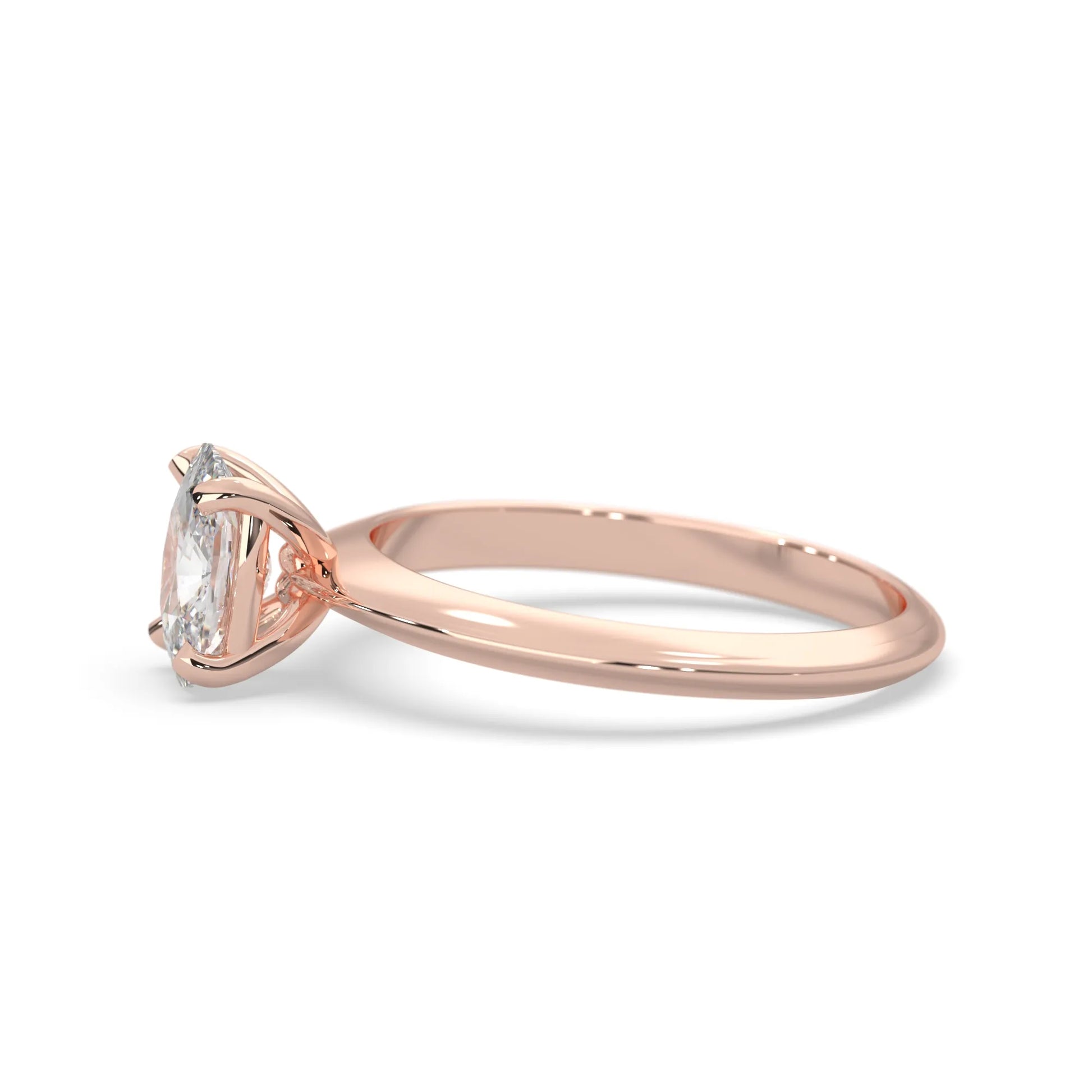 Rose-gold ring with a diamond on a white background