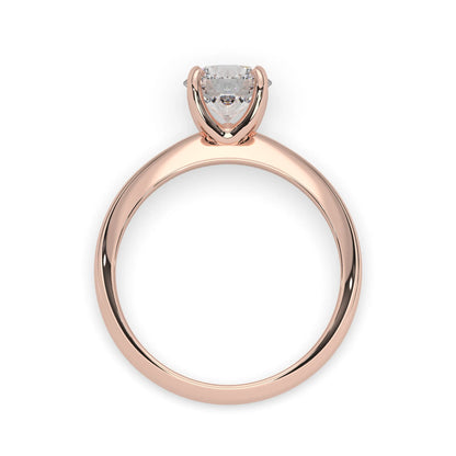 Rose-gold ring with a diamond on a white background