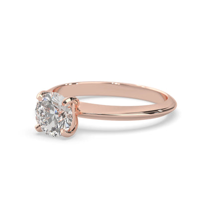 Rose-gold ring with a diamond on a white background