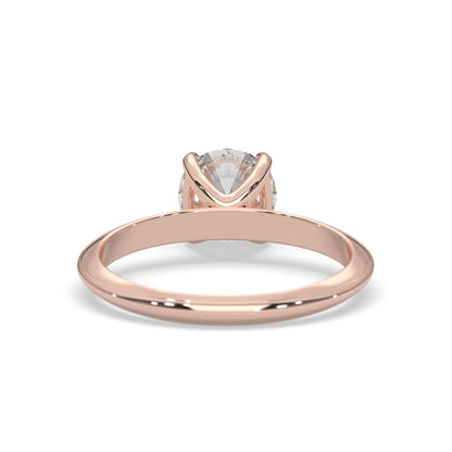Rose-gold ring with a diamond on a white background