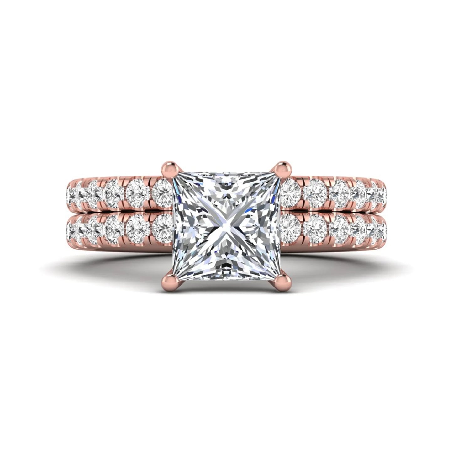 Princess Cut Solitaire Pavé Bridal Ring Set featuring a 7.00 mm IGI Certified lab grown diamond with matching round diamond pavé engagement ring and wedding band in rose gold