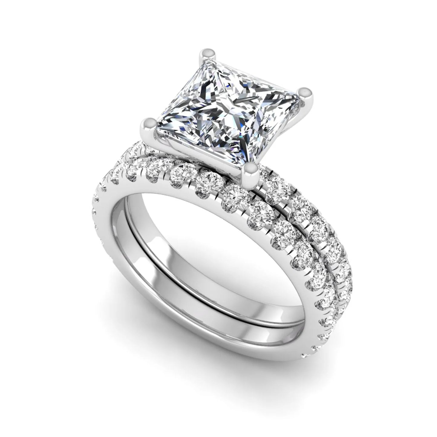 Princess Cut Solitaire Pavé Bridal Ring Set featuring a 7.00 mm IGI Certified lab grown diamond with matching round diamond pavé engagement ring and wedding band in white gold