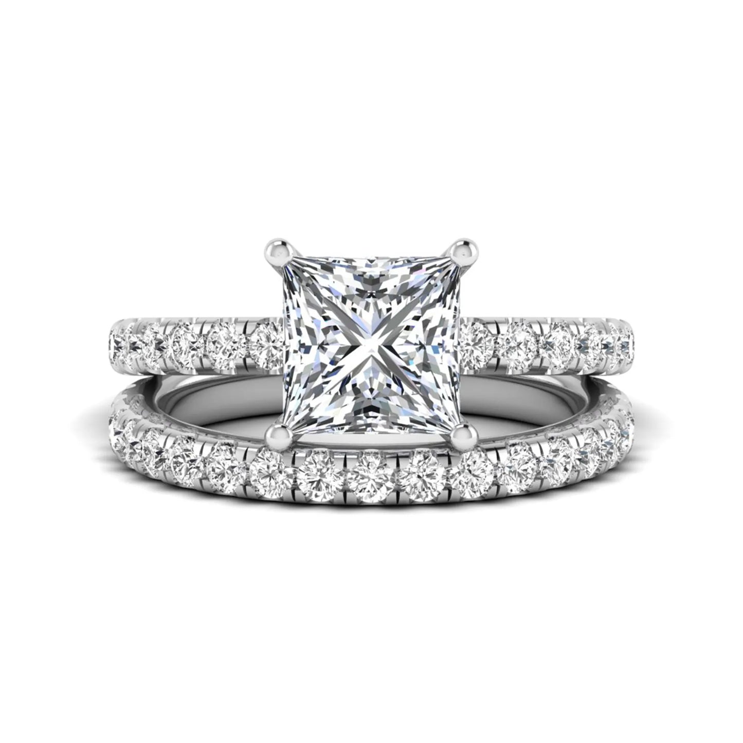 Princess Cut Solitaire Pavé Bridal Ring Set featuring a 7.00 mm IGI Certified lab grown diamond with matching round diamond pavé engagement ring and wedding band in white gold
