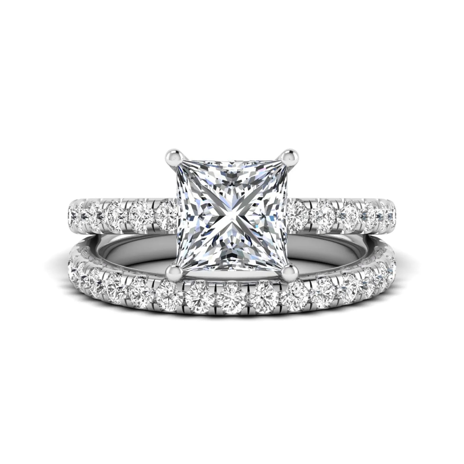 Princess Cut Solitaire Pavé Bridal Ring Set featuring a 7.00 mm IGI Certified lab grown diamond with matching round diamond pavé engagement ring and wedding band in white gold