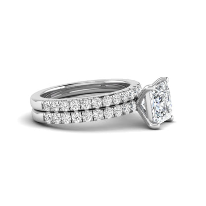 Princess Cut Solitaire Pavé Bridal Ring Set featuring a 7.00 mm IGI Certified lab grown diamond with matching round diamond pavé engagement ring and wedding band in white gold