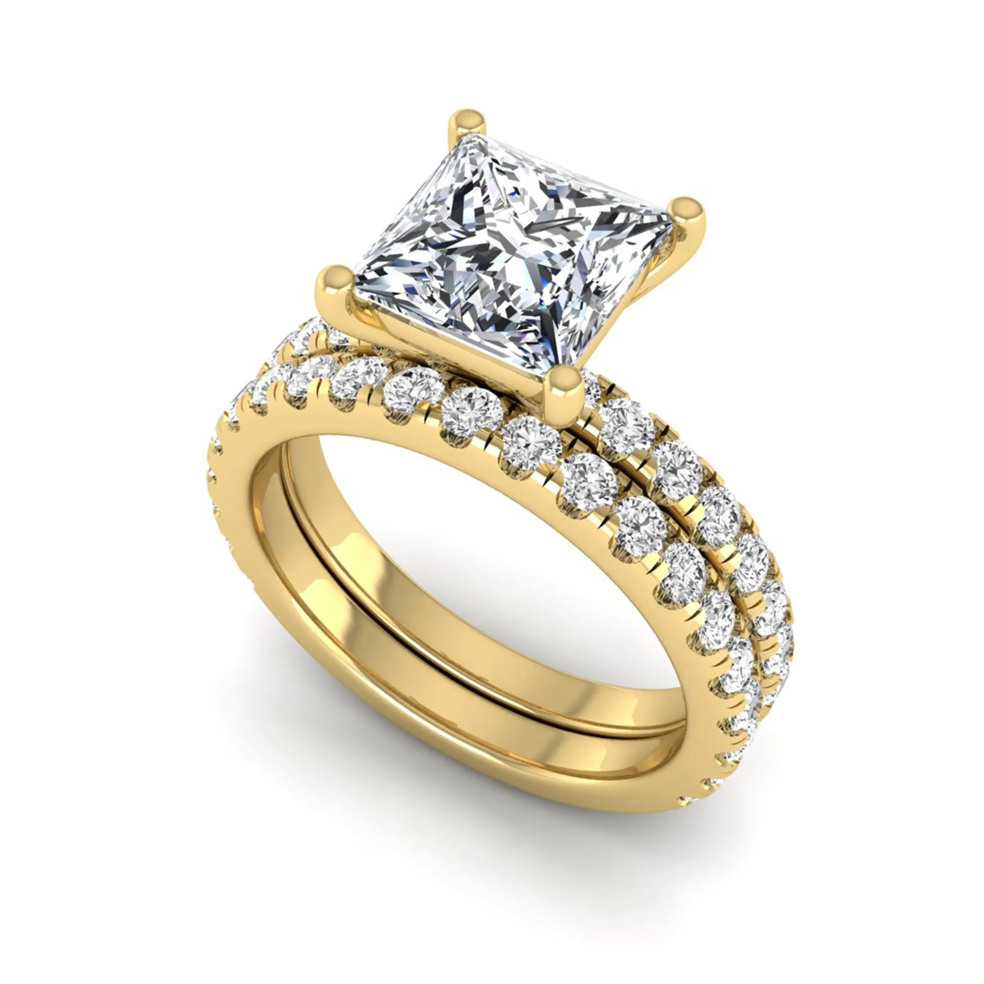 Princess Cut Solitaire Pavé Bridal Ring Set featuring a 7.00 mm IGI Certified lab grown diamond with matching round diamond pavé engagement ring and wedding band in yellow gold