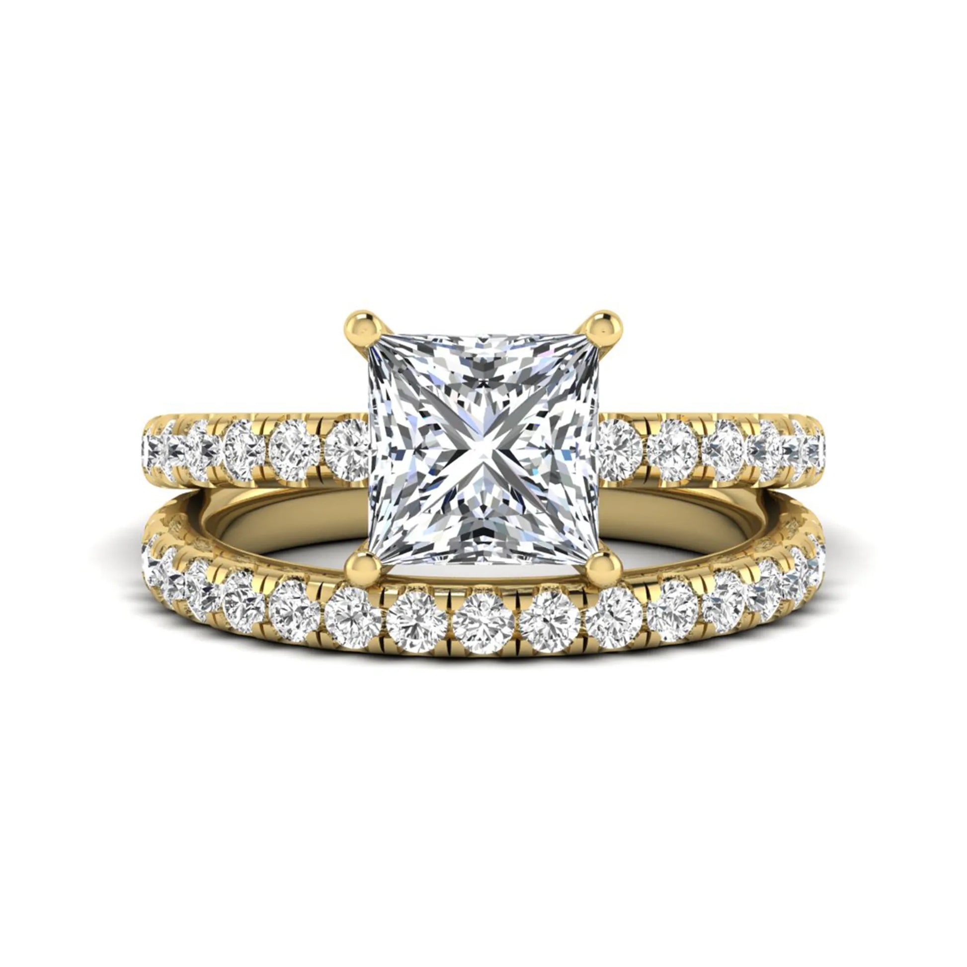 Princess Cut Solitaire Pavé Bridal Ring Set featuring a 7.00 mm IGI Certified lab grown diamond with matching round diamond pavé engagement ring and wedding band in yellow gold