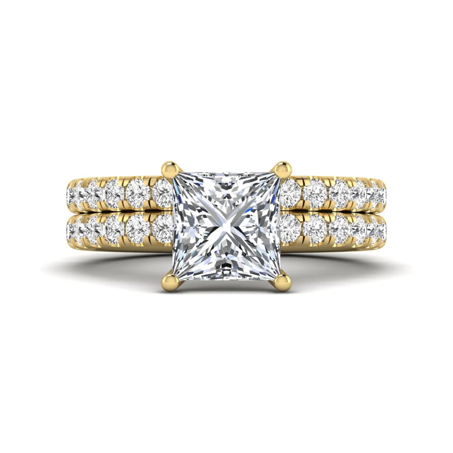 Princess Cut Solitaire Pavé Bridal Ring Set featuring a 7.00 mm IGI Certified lab grown diamond with matching round diamond pavé engagement ring and wedding band in yellow gold