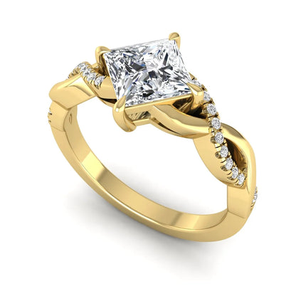 IGI Certified 0.99 carat princess cut lab grown diamond twist engagement ring with pavé round accent diamonds in yellow gold.