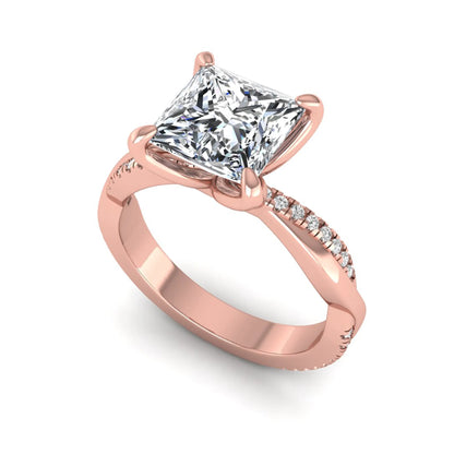 Princess cut lab grown diamond engagement ring with twisted shank and round accent diamonds in rose gold featuring a 1.96 carat IGI certified center diamond.
