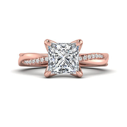Princess cut lab grown diamond engagement ring with twisted shank and round accent diamonds in rose gold featuring a 1.96 carat IGI certified center diamond.