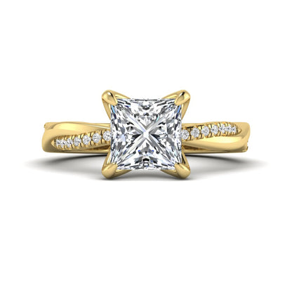 Princess cut lab grown diamond engagement ring with twisted shank and round accent diamonds in yellow gold featuring a 1.96 carat IGI certified center diamond.