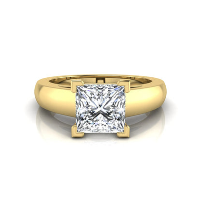 Princess cut four prong lab grown diamond solitaire engagement ring with a yellow gold tone band featuring an IGI certified center diamond.