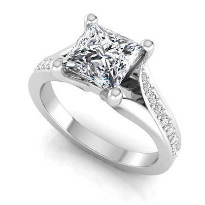 Princess cut lab grown diamond split shank engagement ring featuring a four-prong setting with round accent diamonds in a white gold tone design.