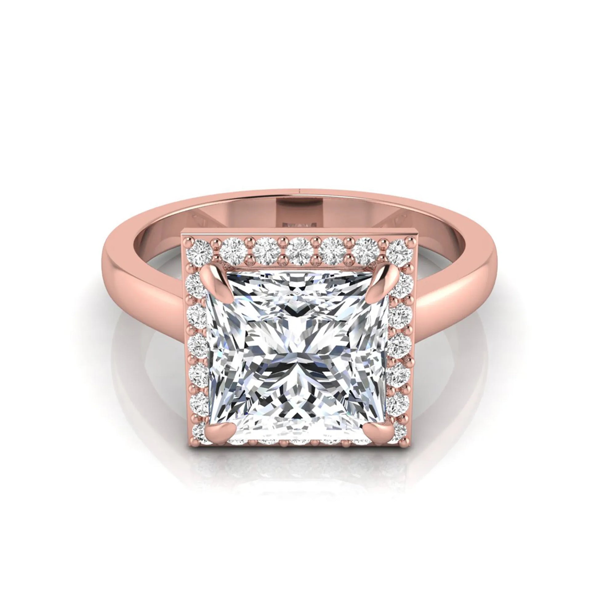 Princess cut lab grown diamond engagement ring featuring an IGI certified center diamond surrounded by a round diamond halo in a classic four-prong setting in rose gold