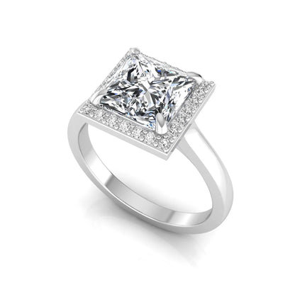 Princess cut lab grown diamond engagement ring featuring an IGI certified center diamond surrounded by a round diamond halo in a classic four-prong setting in white gold