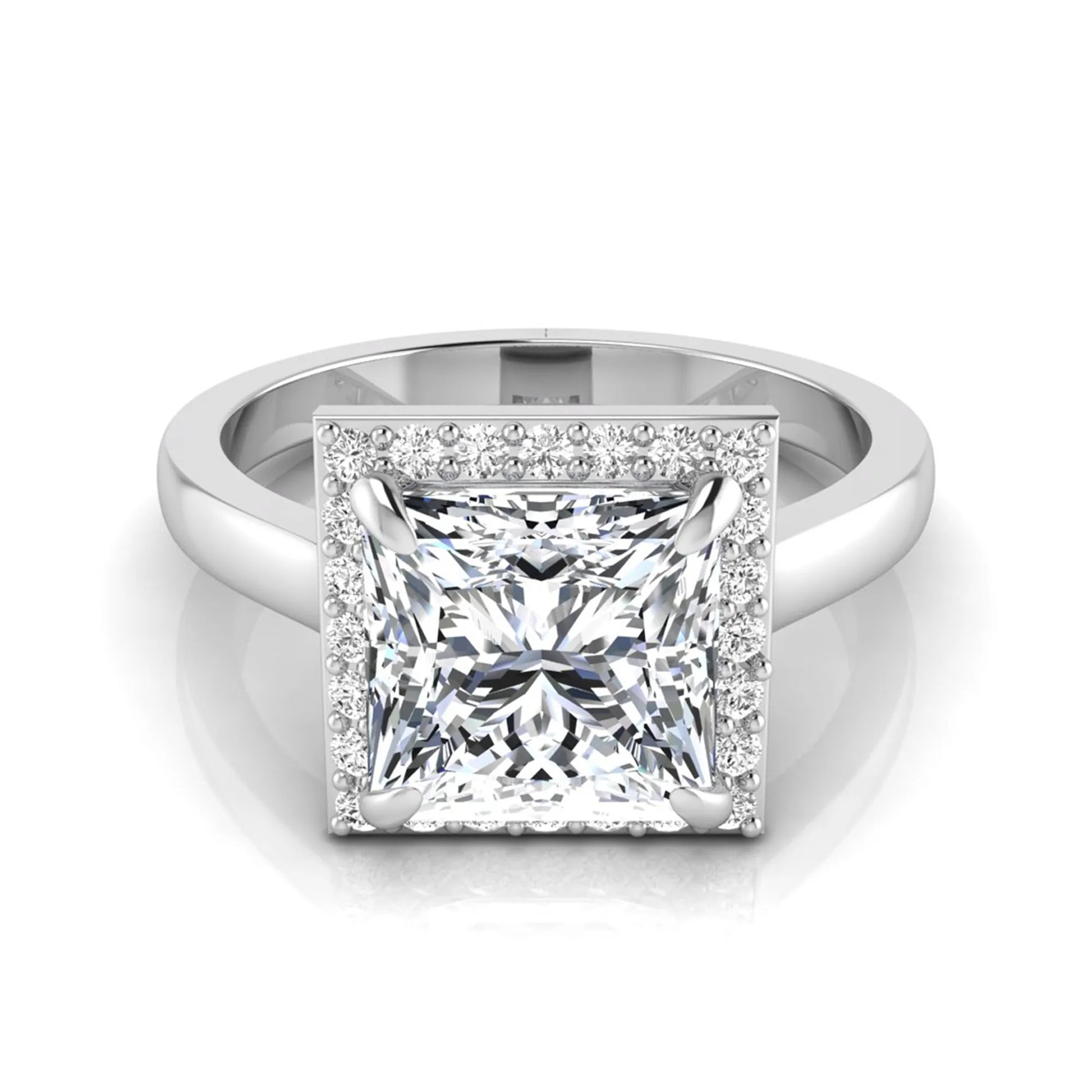 Princess cut lab grown diamond engagement ring featuring an IGI certified center diamond surrounded by a round diamond halo in a classic four-prong setting in white gold