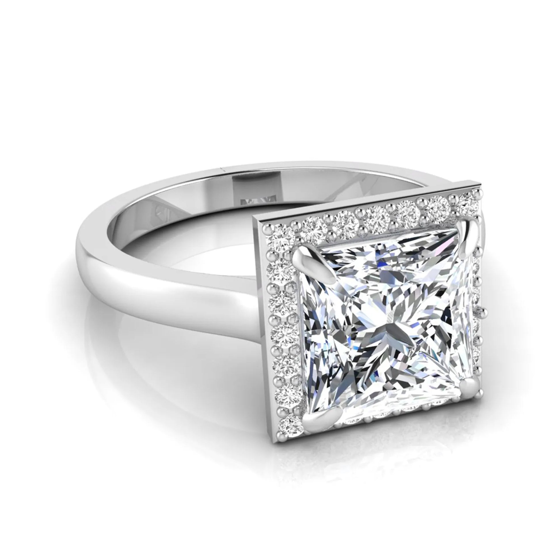 Princess cut lab grown diamond engagement ring featuring an IGI certified center diamond surrounded by a round diamond halo in a classic four-prong setting in white gold