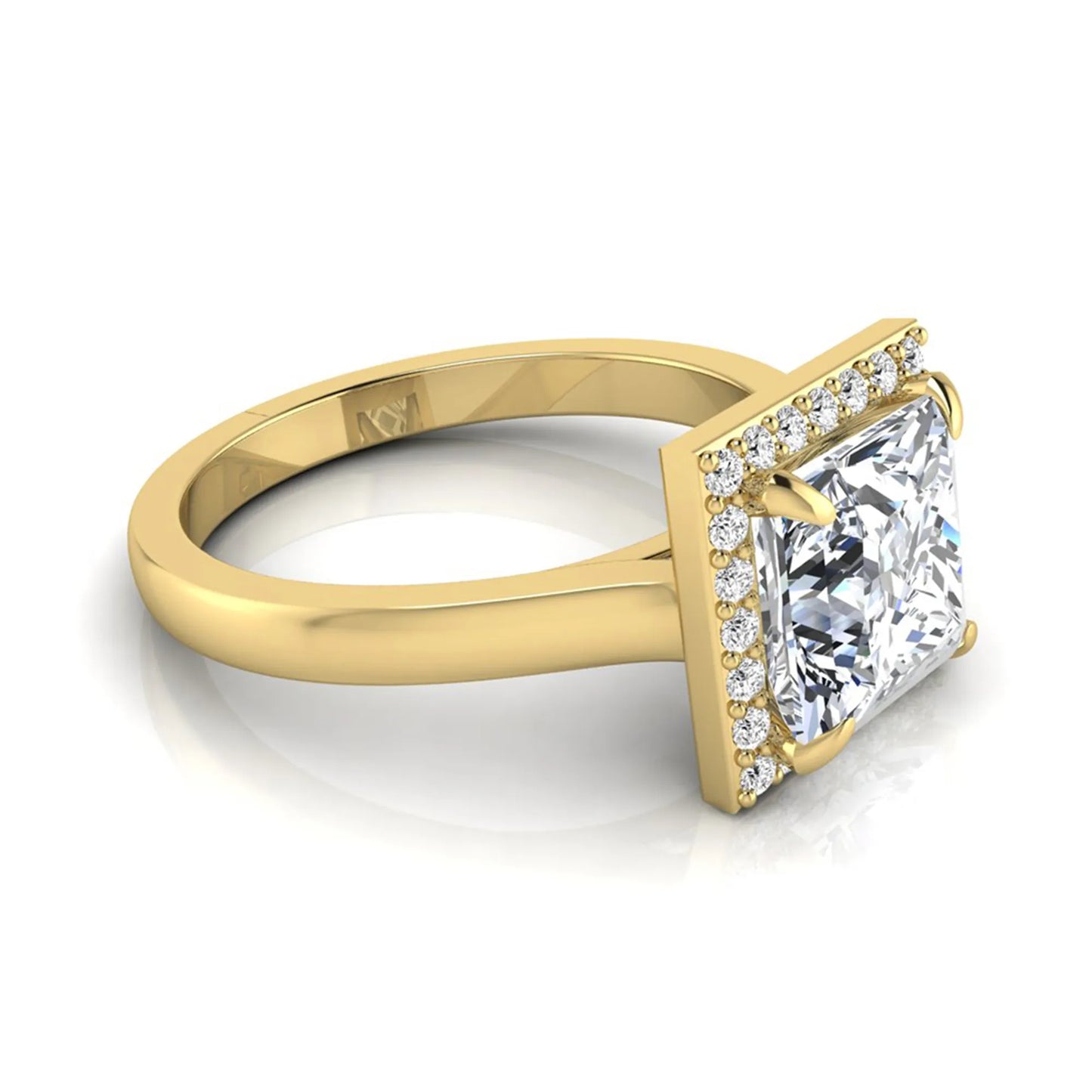 Princess cut lab grown diamond engagement ring featuring an IGI certified center diamond surrounded by a round diamond halo in a classic four-prong setting in yellow gold