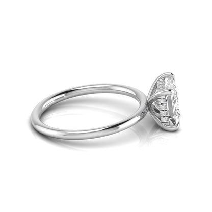 Princess cut lab grown diamond hidden halo solitaire engagement ring with a four-prong setting and white gold tone band.